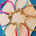 Pulseras pintadera canaria de cordón doradas